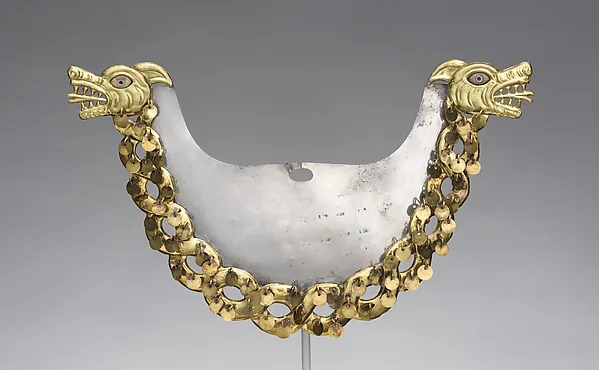 Nose ornament with intertwined creatures