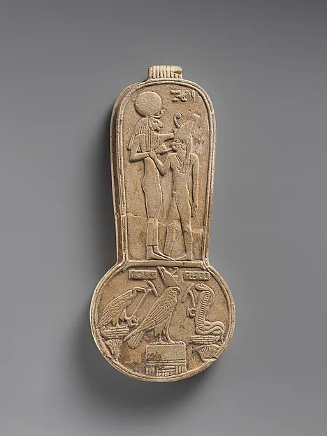 Counterweight of a menit necklace with an image of Bastet nursing King Taharqo