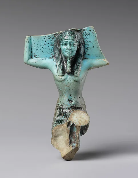Figurine of a kneeling god, probably Shu