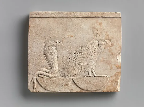 Relief  plaque with Wadjet and Nekhbet, the "Two Ladies"; falcon on opposite