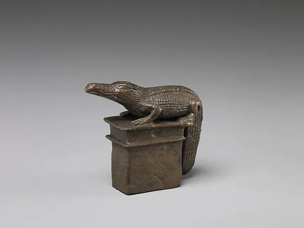 Crocodile on a shrine-shaped base