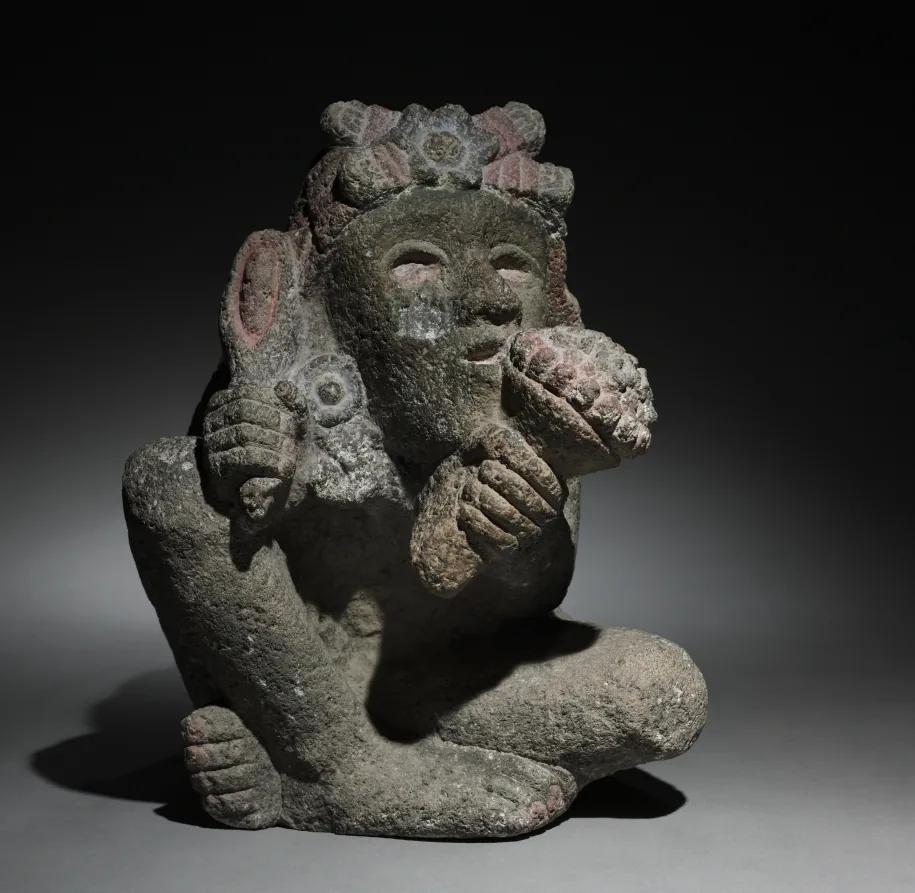 Seated Male Carrying Maize