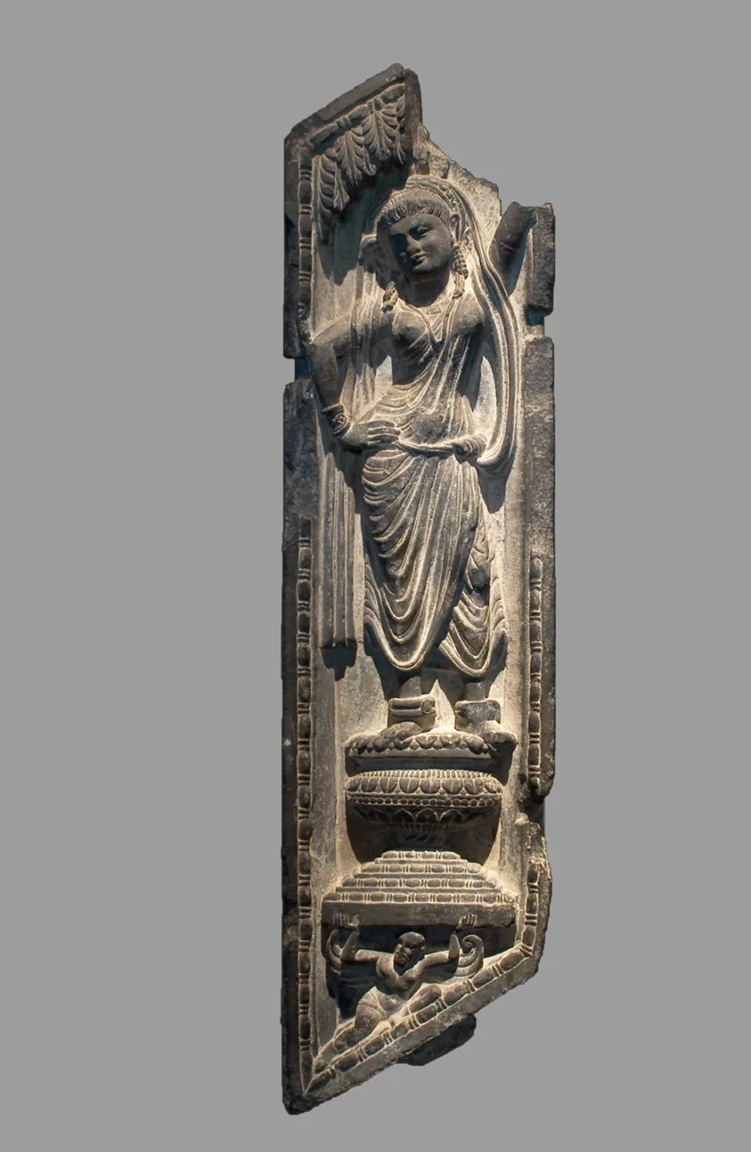 A Yakshi Grasping a Tree
